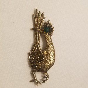 vintage goldtone Ambassador roadrunner pin